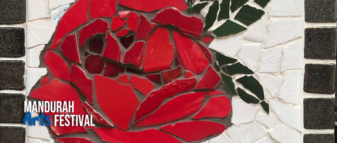 A mosaic comprising a red rose with two green leaves against a white background